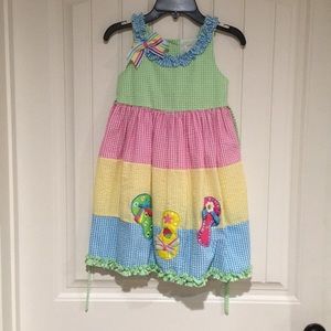 Multi colored girls dress with flip flops